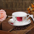 ceramic colored coffee cup and saucer